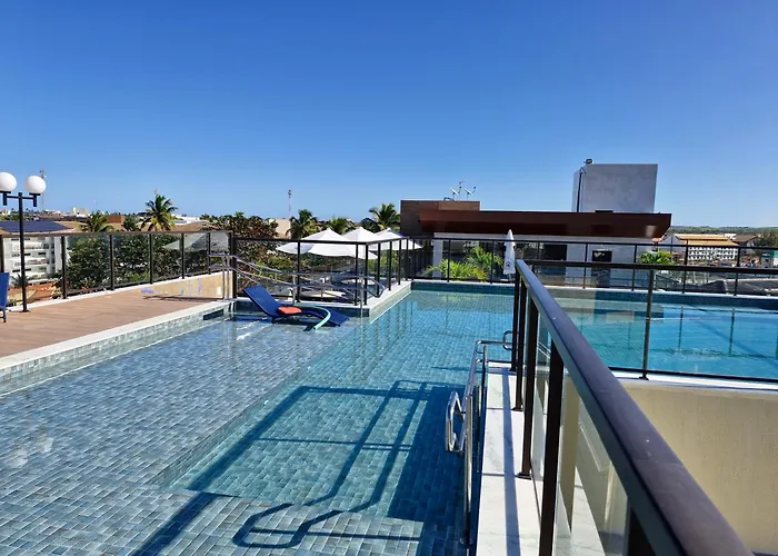 Flat com Piscina, Rooftop e Poucos Passos da Praia Porto de Galinhas